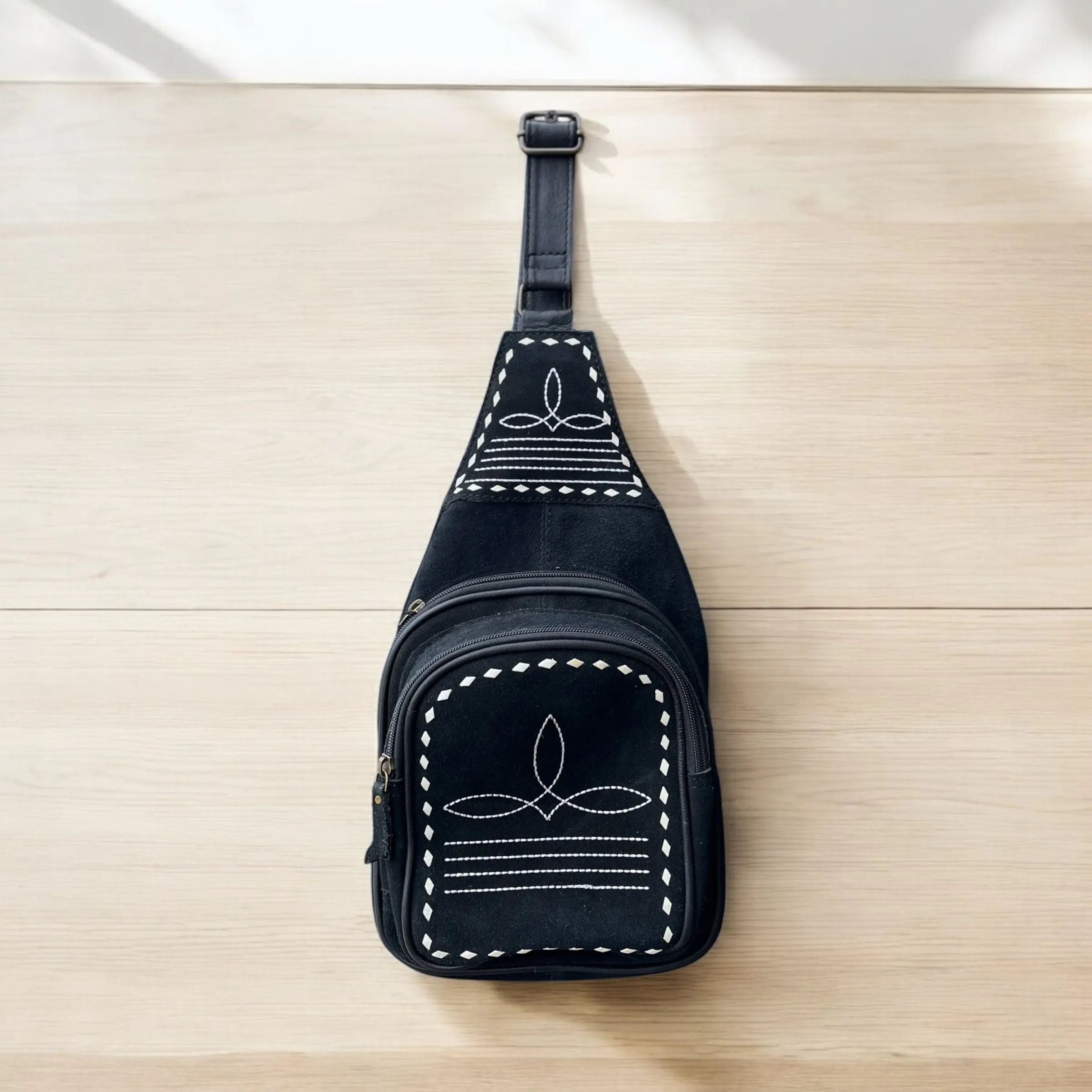 Black BootStitch sling bag