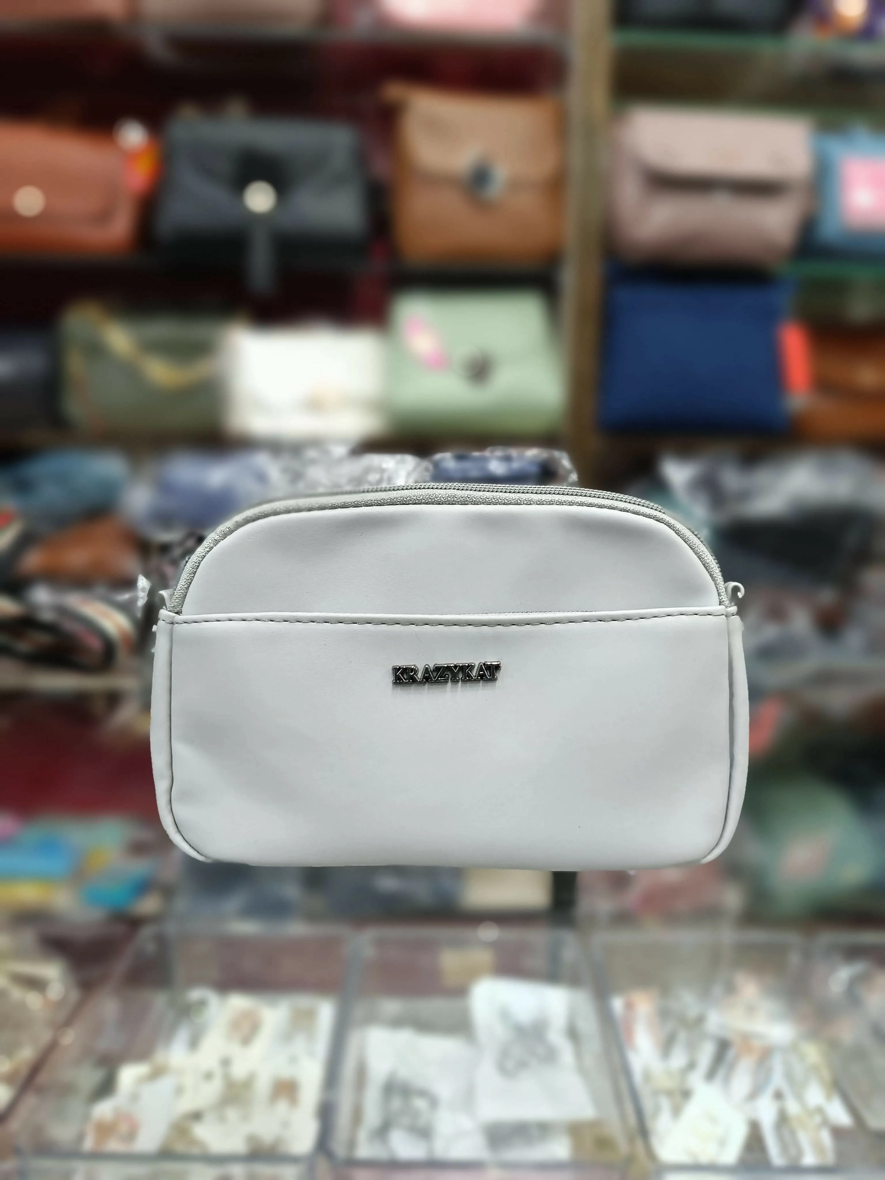 White women's sling bag for parties / travel