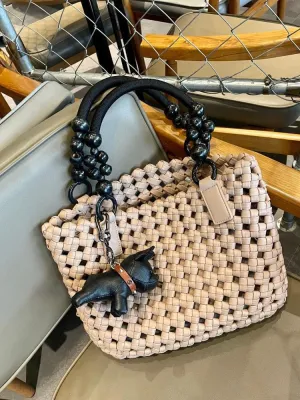XIEYINSHE 2025 women's bags, large-capacity vegetable baskets, woven tote bags, portable high-grade hollow wooden beads, wrist and mother shoulder bags.
